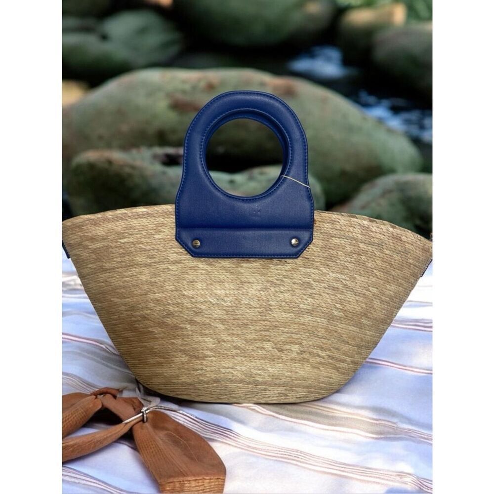 By Del Rio Straw beach tote bag with blue leather trim New